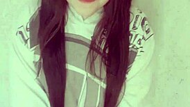 Shy brunette masturbating alone