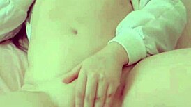 Shy brunette masturbating alone