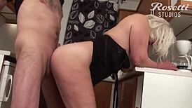 german blonde milf with big tits and boobs on display, showing off her curves