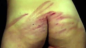 intense bdsm session with spanking and whipping on mature woman in private