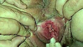 playing with her pussy bent over to see all the pink hairy milf gaping