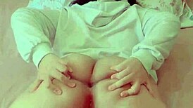 Shy brunette masturbating alone