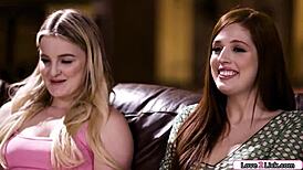 redhead casually fingers curvy blonde's pussy