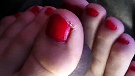 My friend gives an amazing footjob in the car, leading to cum