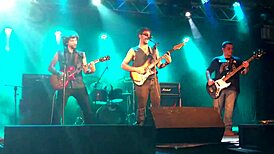 Cinnamon performs rock n roll live on the road