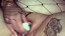 brunette uses dildo for squirting cum on big natural tits