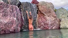 monika fox strips naked in a beautiful place and masturbates her big tattooed tits