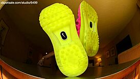 Tall girl shows sexy barefoot feet in Nike shoes for foot fetish domination