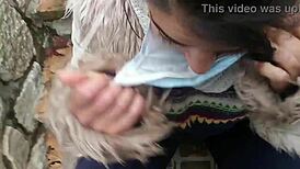 Passionate outdoor blowjob with natural tits flashing in the park