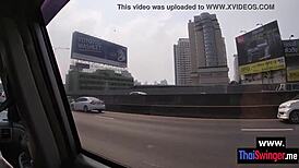 petite asian babe sucks friend's big dick then gets fucked from behind.