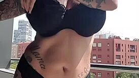 Neighbors spy on this milf masturbating her big tits in a voyeur fetish