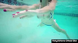 Horny Vicky Vette fingers her pussy at the pool