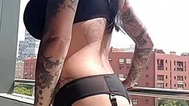 Neighbors spy on this milf masturbating her big tits in a voyeur fetish