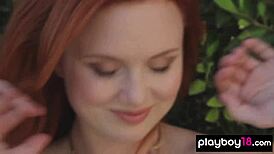 molly shaw, the all natural redhead beauty, strips seductively on the balcony, her clothes ripped off.