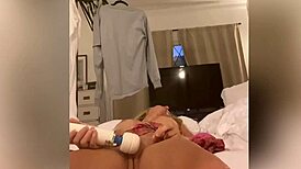 Busty blonde squirts while playing with dildo, a surprising contrast