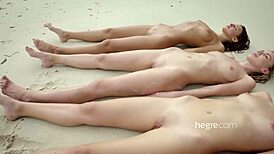 Wow, check these 4 gorgeous girls naked on the beach! 😍