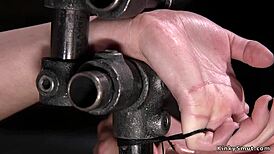 I watched a brunette in spread eagle bondage getting caned hard