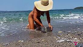 Wow, check nippleringlover, hot mom with extreme stretched nipple piercings at nude beach! 😍