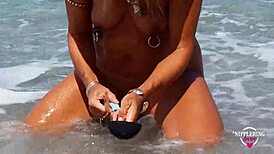 Wow, check nippleringlover, hot mom with extreme stretched nipple piercings at nude beach! 😍