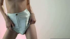 see this kinky babe play with her soaked shaved pussy