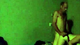 That redhead slut in stockings and uniform is bent over getting fucked doggy style.