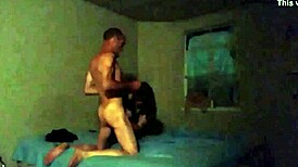 That redhead slut in stockings and uniform is bent over getting fucked doggy style.