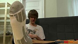 Teen Performs Footjob on Twink's Soles