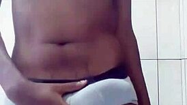 young guy playfully stroking his cock in sexy solo session