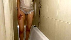 In the Shower, Cute Brunette Dances in White Underwear