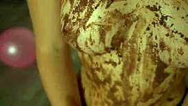 young girl crushes cake with butt