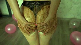 young girl crushes cake with butt