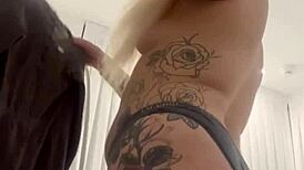 Blonde Tattoo Tease Removing Clothes