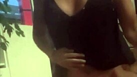 This white mature lady plays with a big black dildo at home