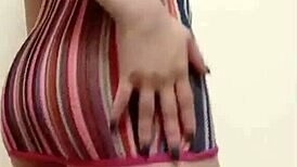 Sexy Asian Woman Dances Bare Under Skirt