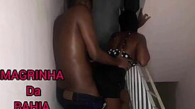 in the unfinished building, the young latina guy gives oral to the black cock, leading to anal and orgasm outdoors.