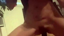 This white mature lady plays with a big black dildo at home