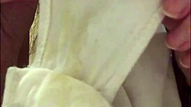 Brunette strips and shows her wet pussy.