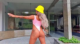 Teacher shows stretching class with big ass.