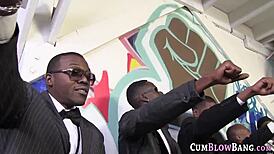 Brunette deepthroats monster cocks in blowbang