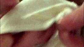 Brunette strips and shows her wet pussy.