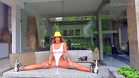 Teacher shows stretching class with big ass.