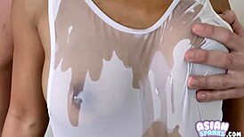 Flat Asian Teen Masturbates with Oiled Body