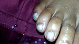 Ebony foot job with cumshot on feet