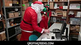 Teen Elves Work With Santa At Shop