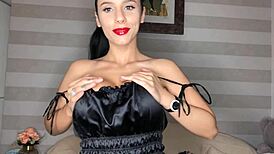 Nelly Kent sucks big dildo with red lips