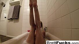 Busty Brett Rossi gets super horny in a steamy hot bath