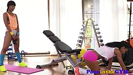 Athletic ebony babes fingering pussies in gym spandex