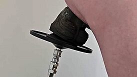 Watch that monster black dildo fuck my ass on the machine!