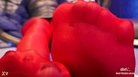 Toes wiggling in red shiny pantyhose