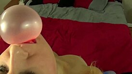 Blonde Girl Blows Giant Bubble Gum Bubbles